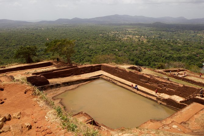 Private Day Trip to Sigiriya, cave and National park Safari Tour - Stop 2: Dambulla Cave Temple and the Golden Temple Feel